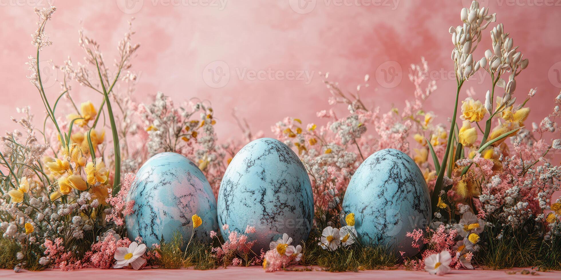 Colorful decorative eggs arranged among delicate spring flowers in a lovely floral display photo