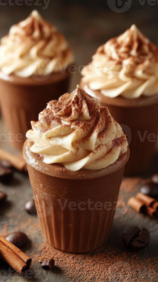 Delicious chocolate mousse topped with creamy whipped frosting and cocoa powder in cozy cafe setting photo