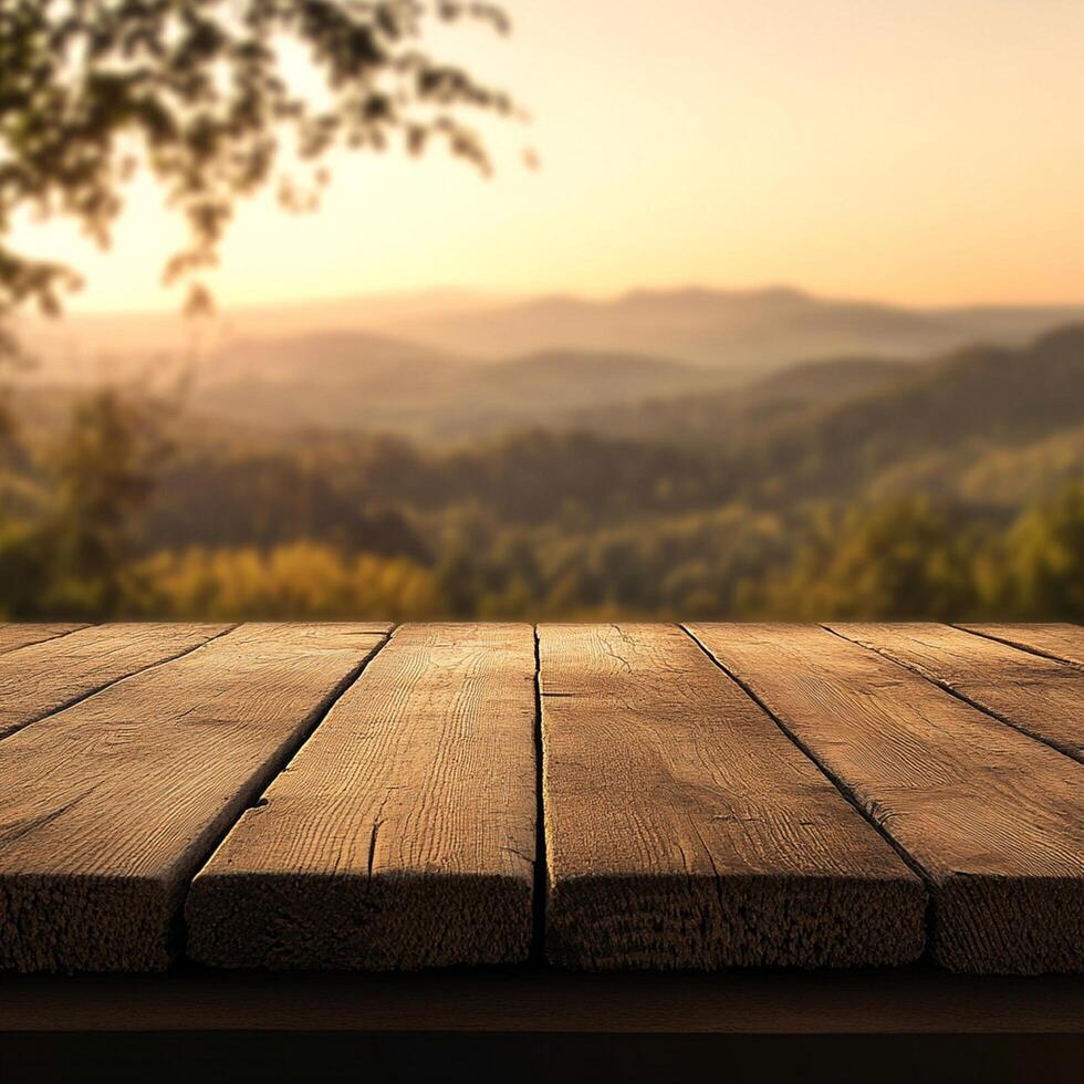 An empty wooden table with a view of the mountains photo