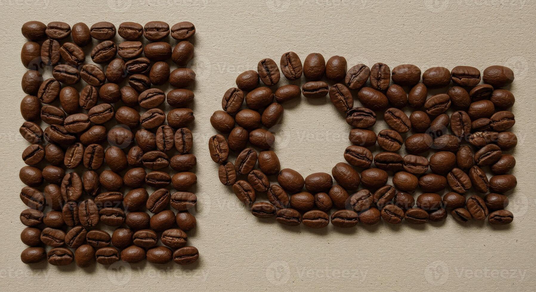 Coffee beans arranged in the shape of a letter photo