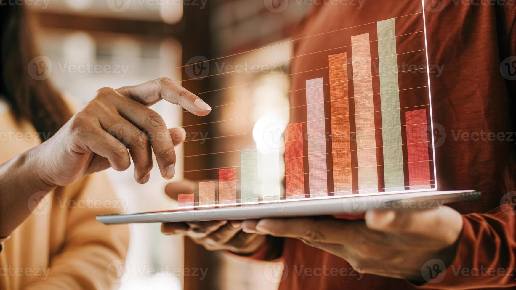 A focused shot of a holographic bar chart floating in the air with a user pointing at specific data points to analyze business performance in realtime.. photo