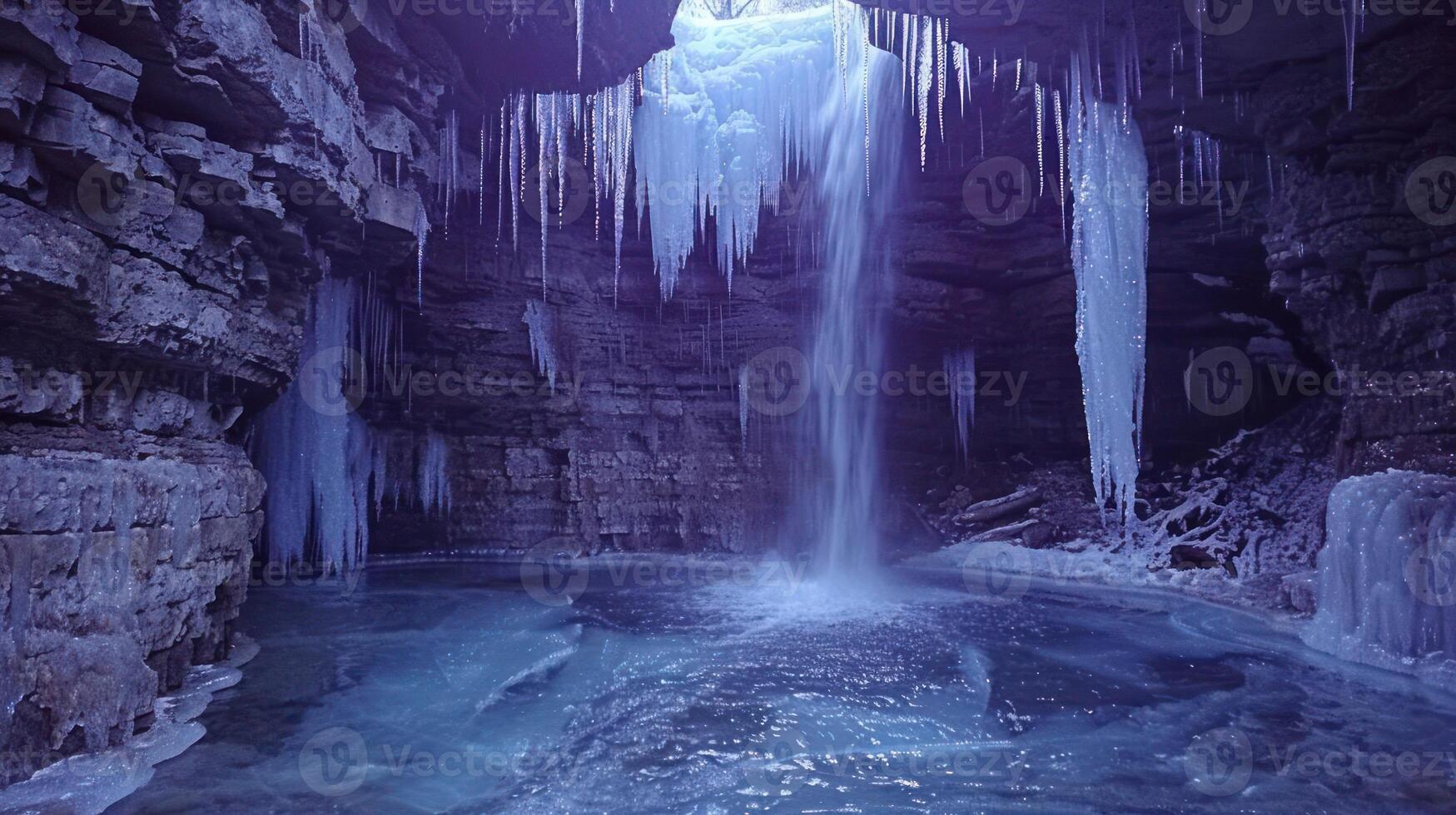 A serene icy cave with a waterfall and icicles, creating a tranquil winter scene. photo