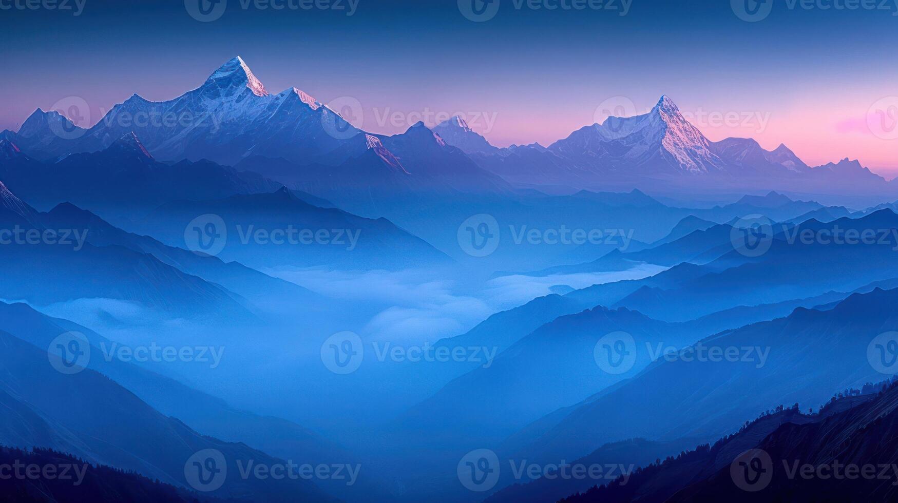 A serene mountain landscape at dawn, showcasing peaks bathed in soft light and mist. photo
