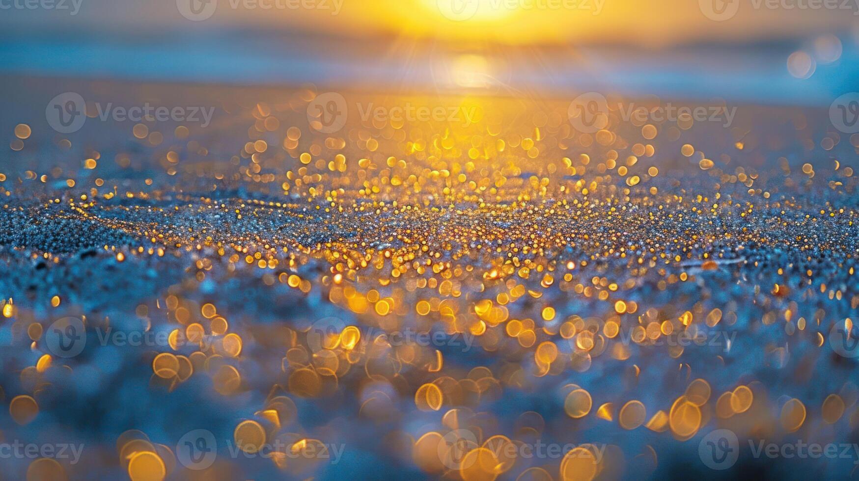 A close-up view of shimmering sand at sunset, capturing a tranquil beach atmosphere. photo