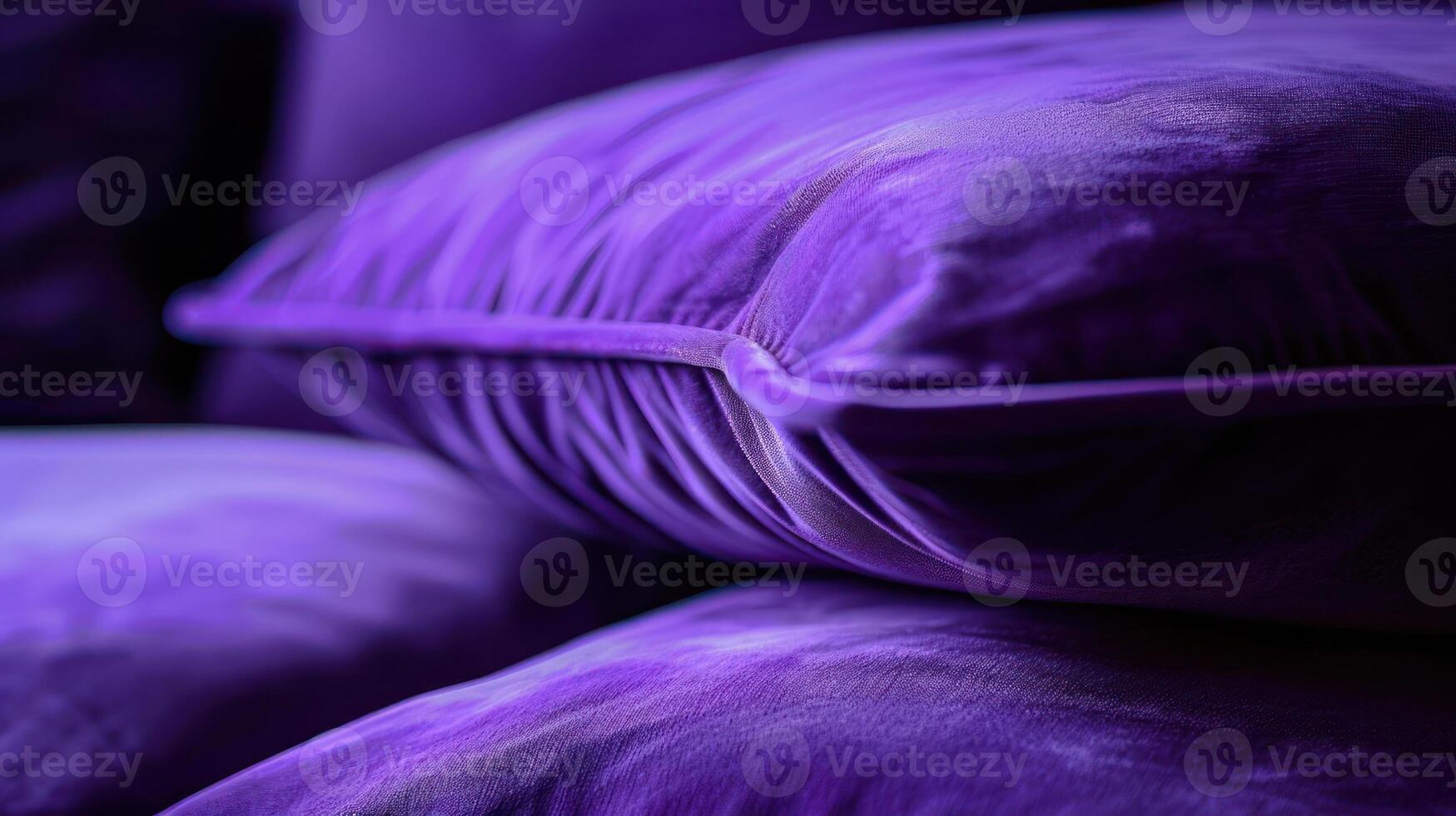 Close-up of plush purple pillows showcasing texture and color. photo
