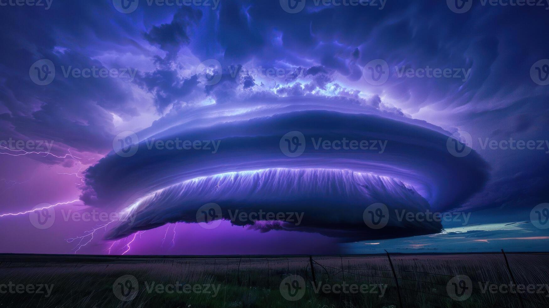 A dramatic storm cloud formation illuminated by lightning against a twilight sky. photo