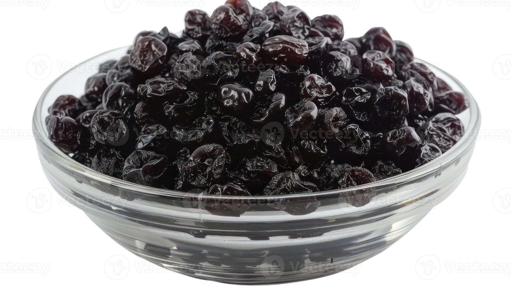 A bowl filled with dried black currants, showcasing their rich color and texture. photo