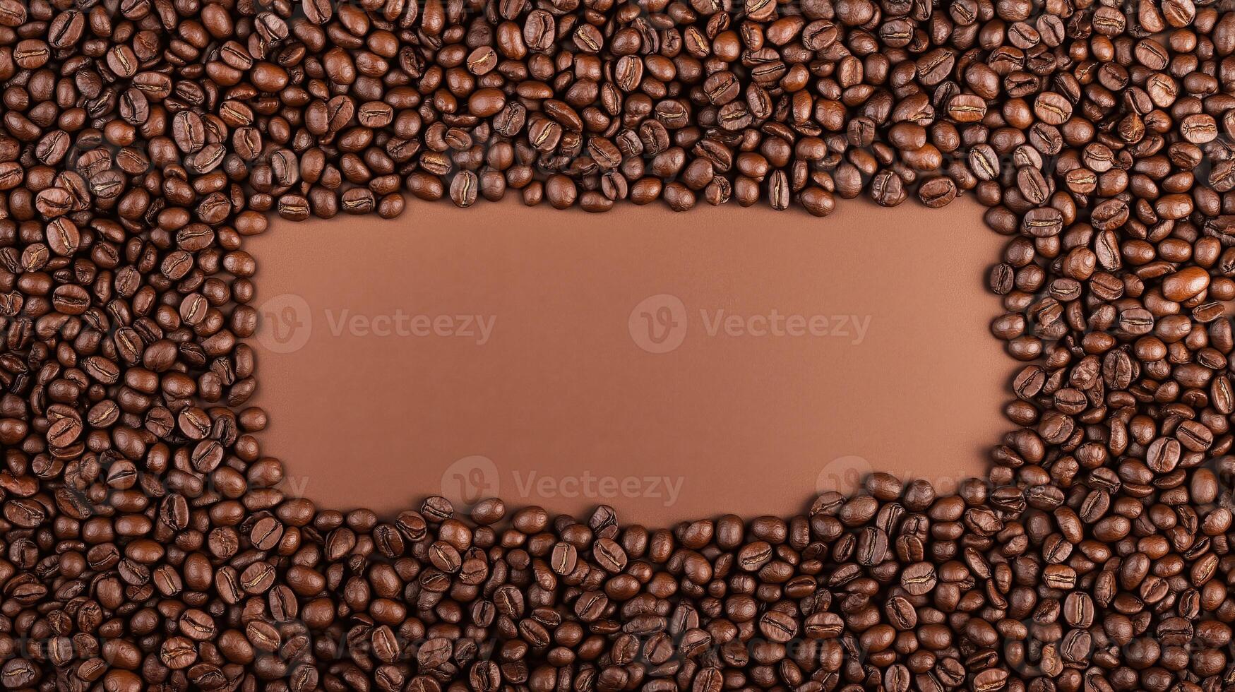 Coffee beans as a background with empty space in the center photo