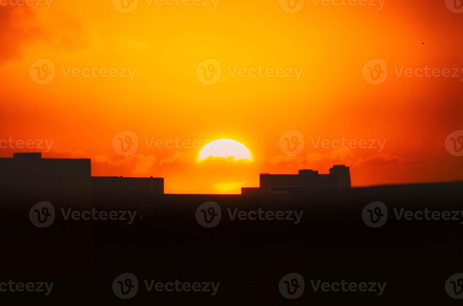 Urban Sunrise Silhouette with Golden Sky city morning photo