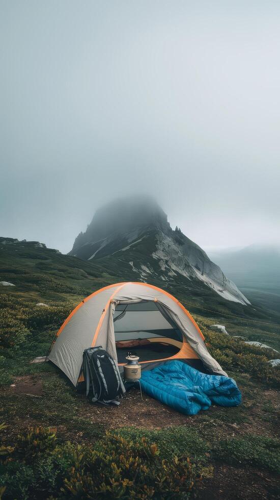 Mountn camping travel tentxaxa and morning fog photo