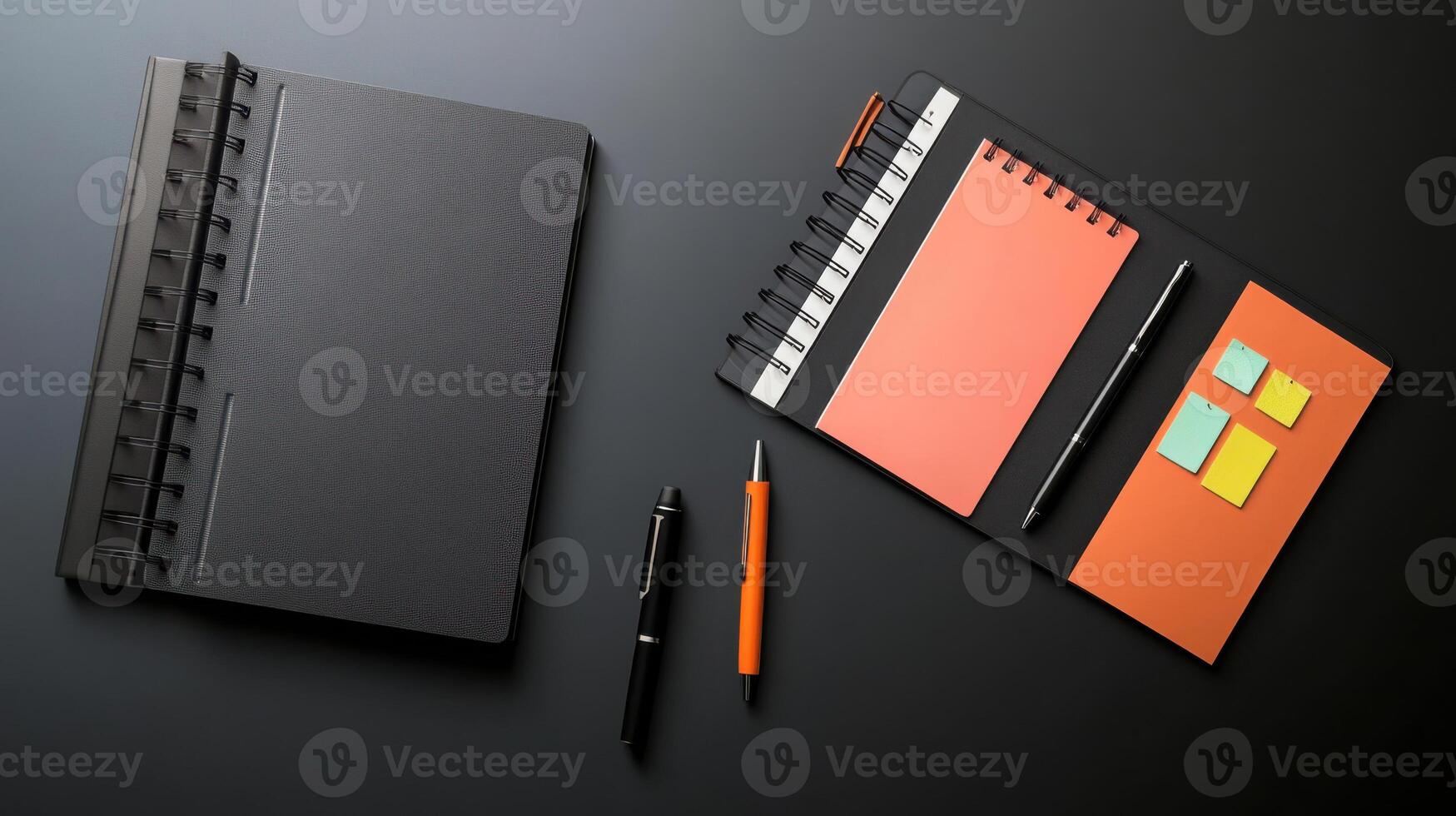 desk setup featuring notebooks, sticky notes, and pens for organization photo
