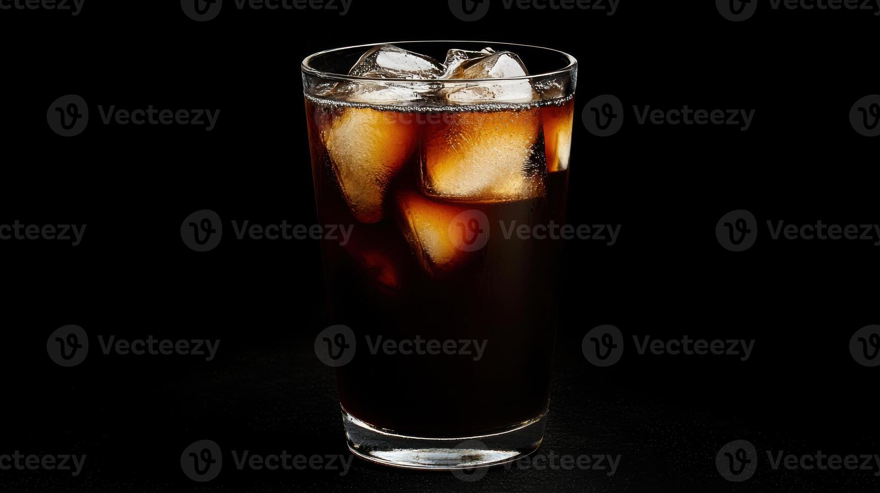 Freshly brewed cold coffee with ice in clear glass, perfect for summer photo