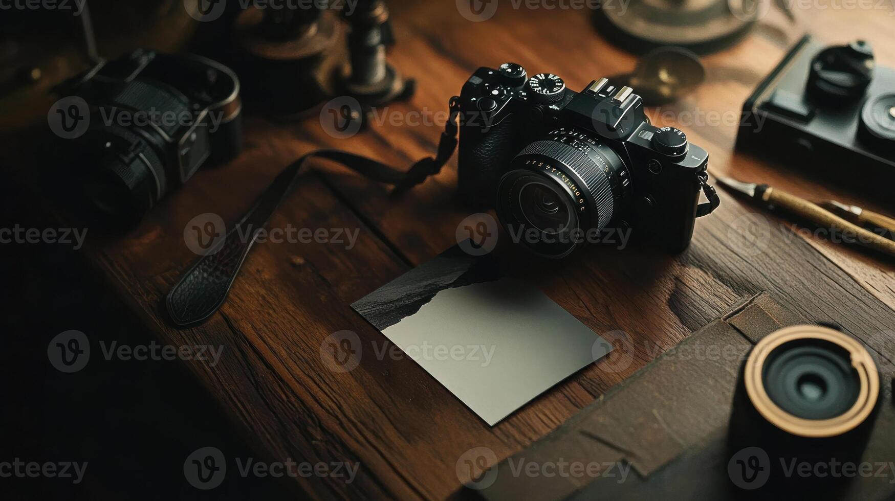 vintage camera on wooden table with photo and accessories