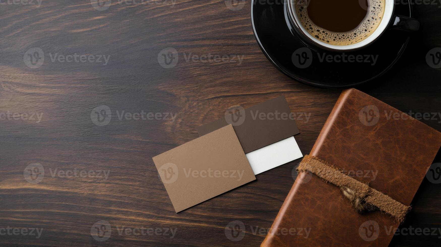Handmade business cards on wooden table with coffee photo