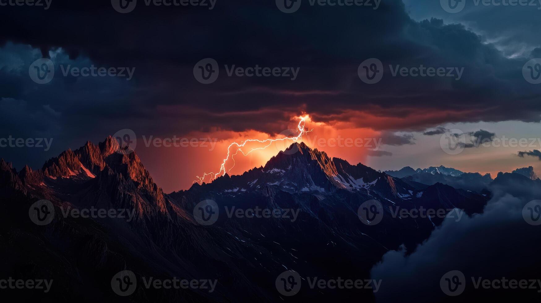 A lightning bolt strikes through the clouds over a mountain range photo