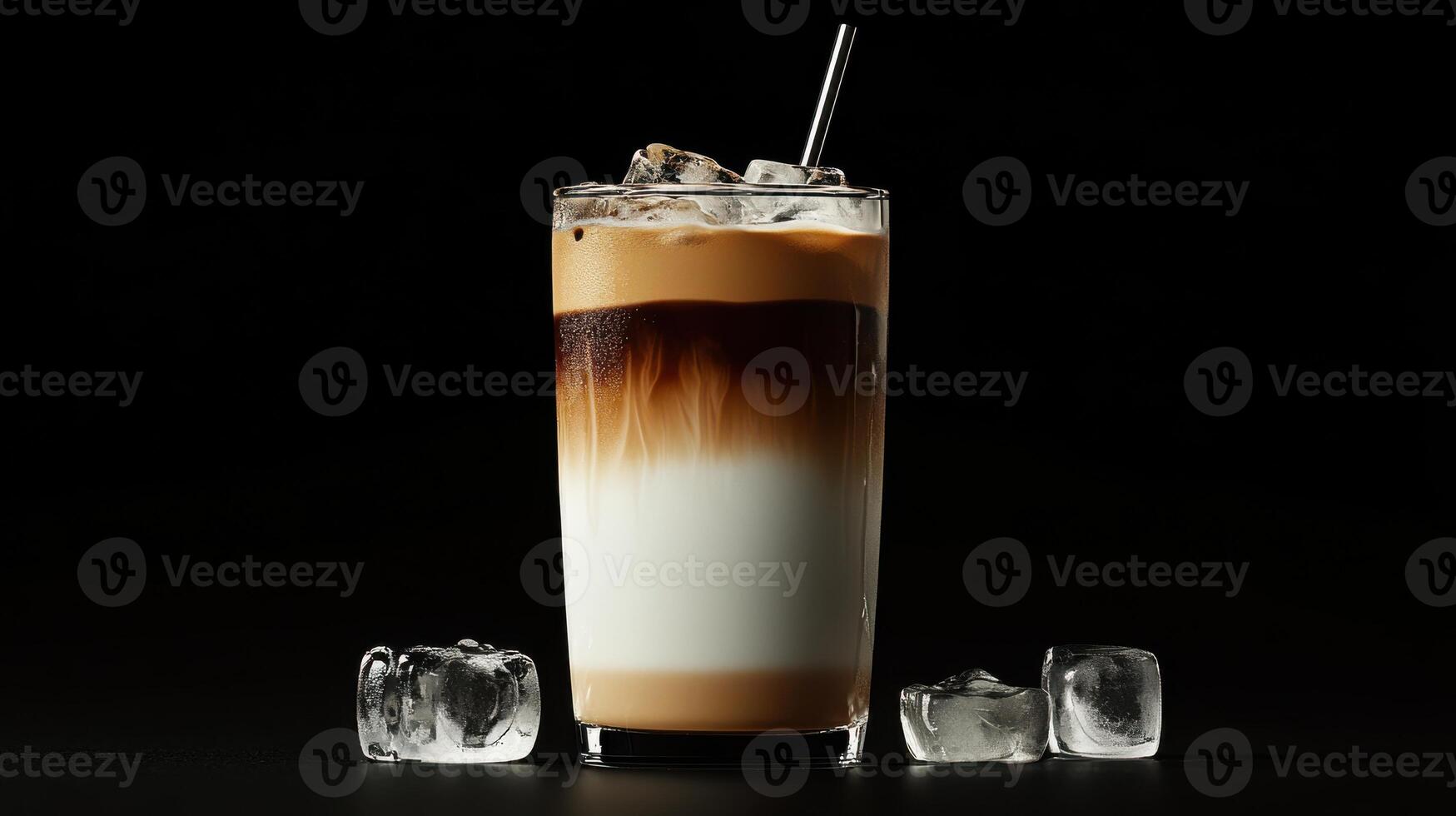 Iced coffee with ice cubes on a black background photo