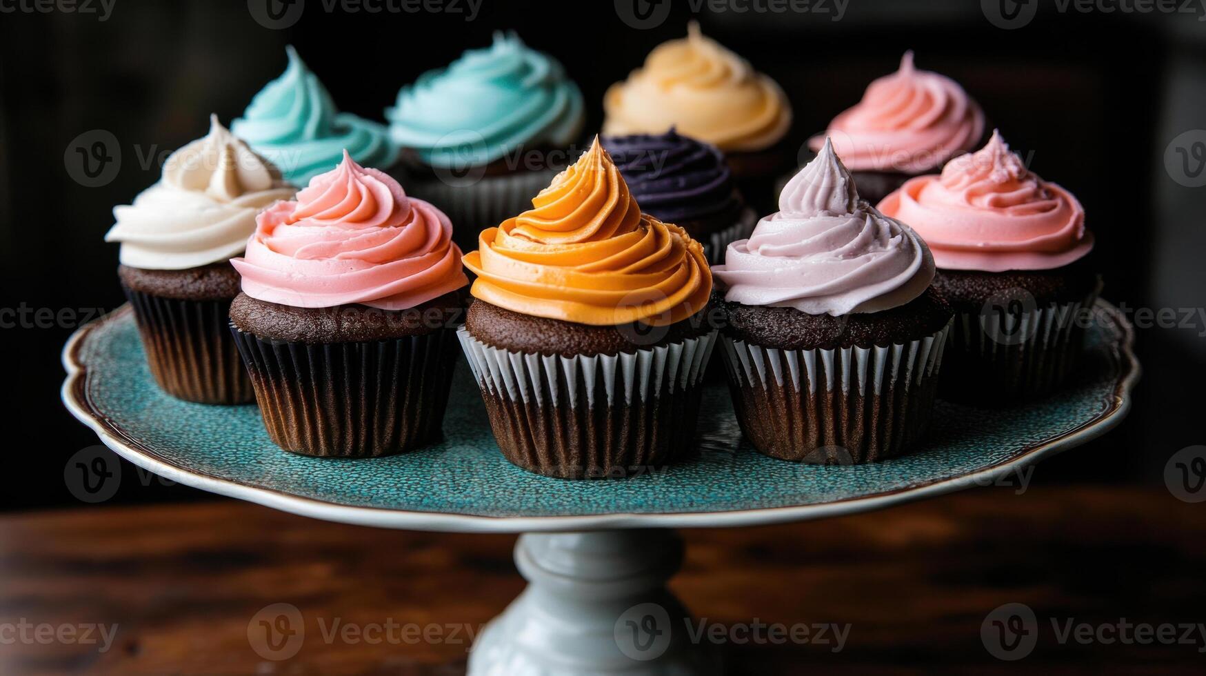 Vibrant cupcakes with pastel frosting on decorative plate photo