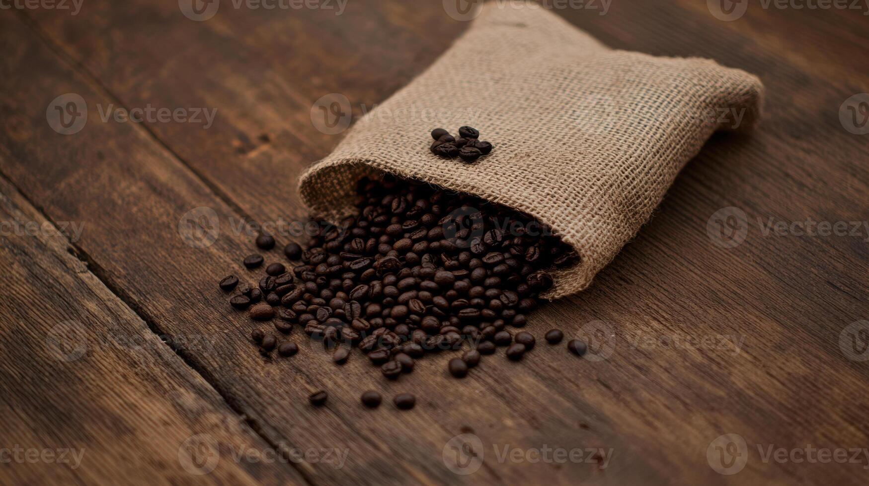 Coffee beans in a bag on a wooden table photo