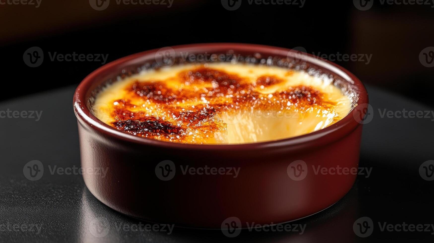 Creamy dessert with caramelized sugar crust, perfect indulgence photo