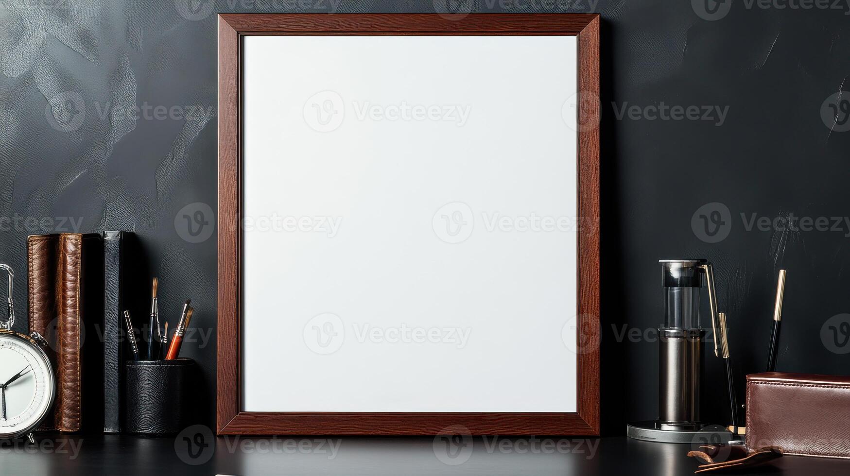 Empty frame on desk with office supplies and clock photo