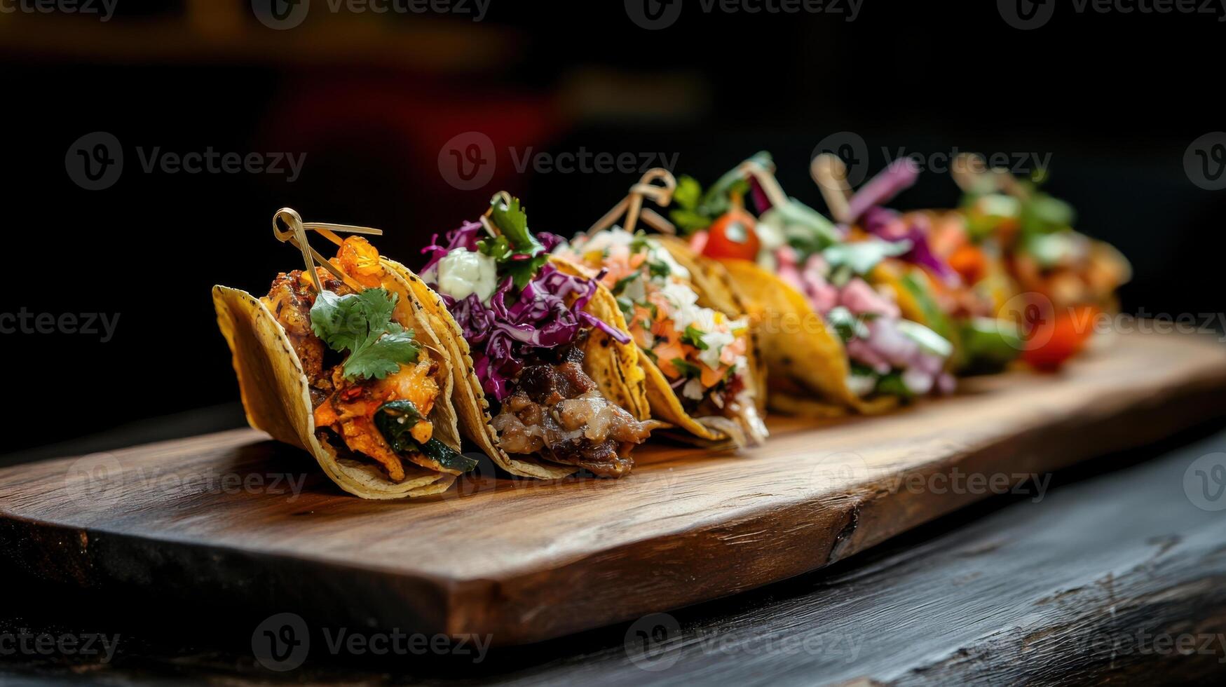 A wooden tray with tacos on it photo