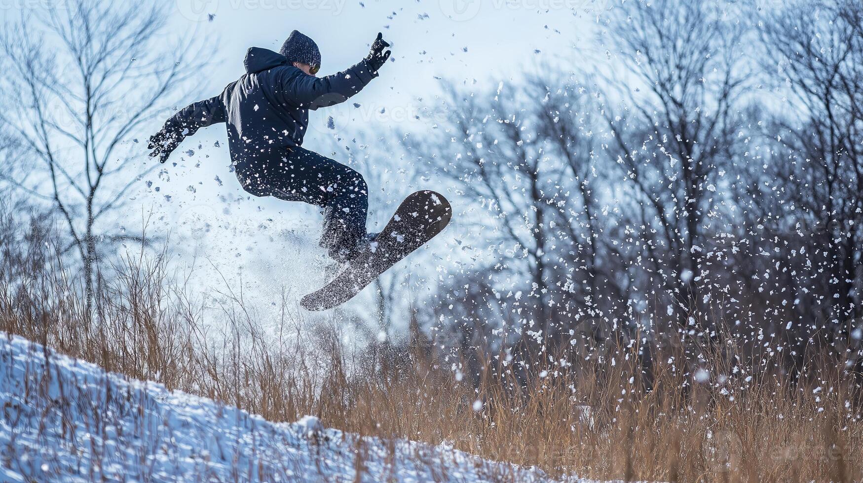Snowboarder performing a high jump with snow flying around against a bright winter sky. Extreme sports and adventure concept. High quality illustration photo