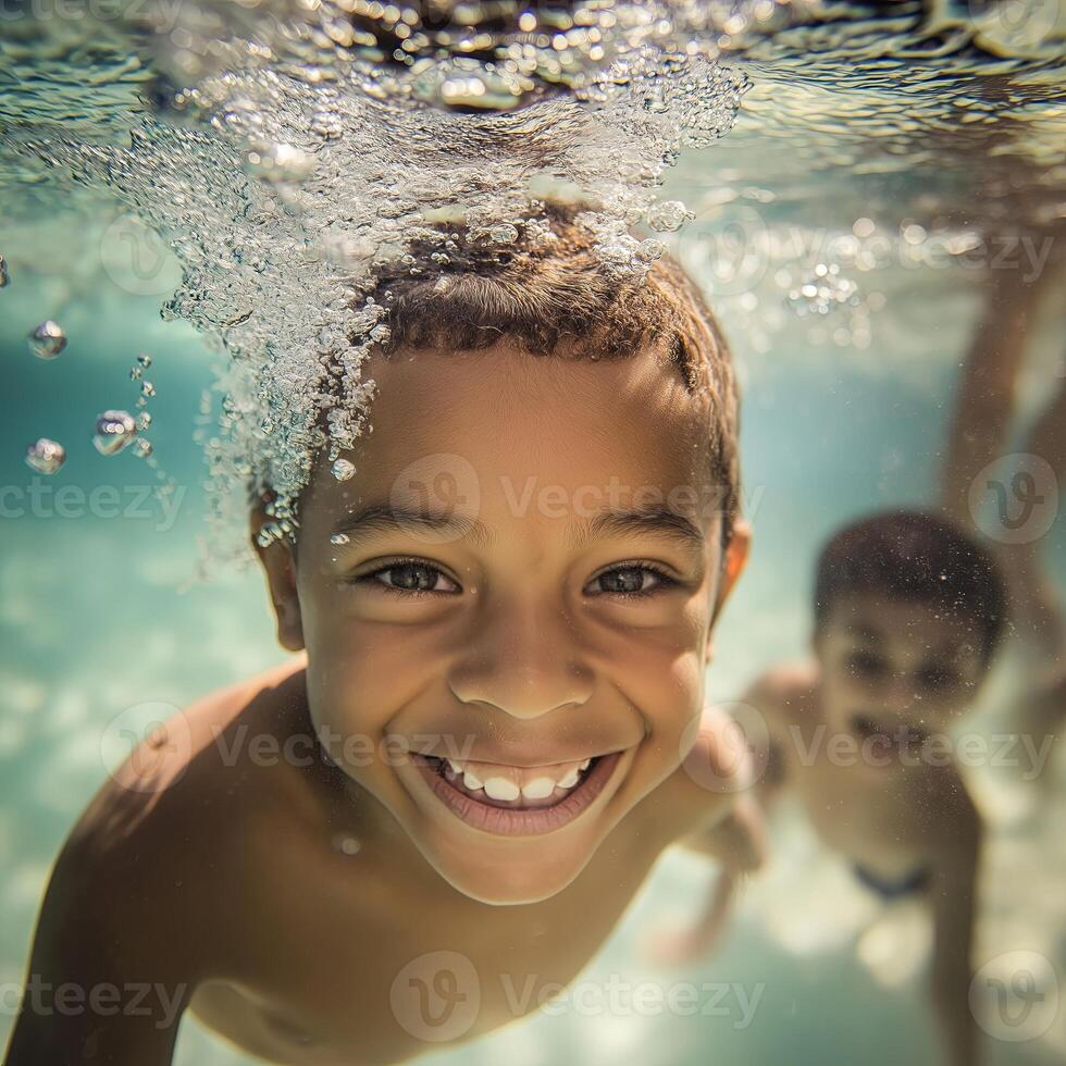A group of cheerful kids playing and laughing underwater in a swimming pool, enjoying summer fun and friendship. photo