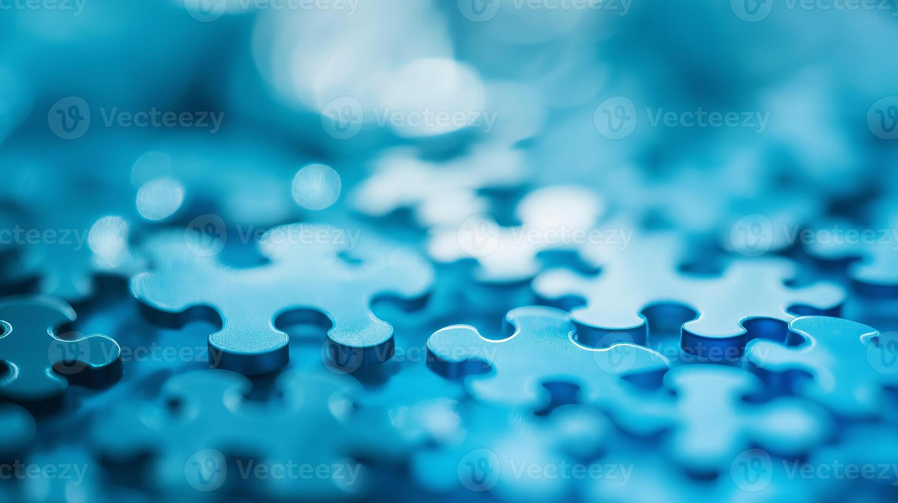 A close-up of blue jigsaw puzzle pieces, symbolizing problem-solving, teamwork, strategy, and mental challenges in education and brain games. photo