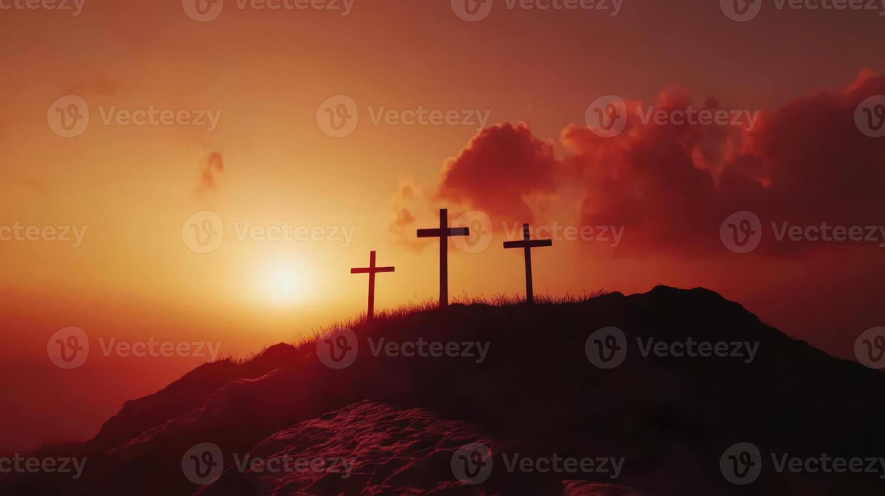 A powerful image of three crosses silhouetted against a vibrant sunset on a hill, symbolizing Jesus' crucifixion and Christian faith. photo