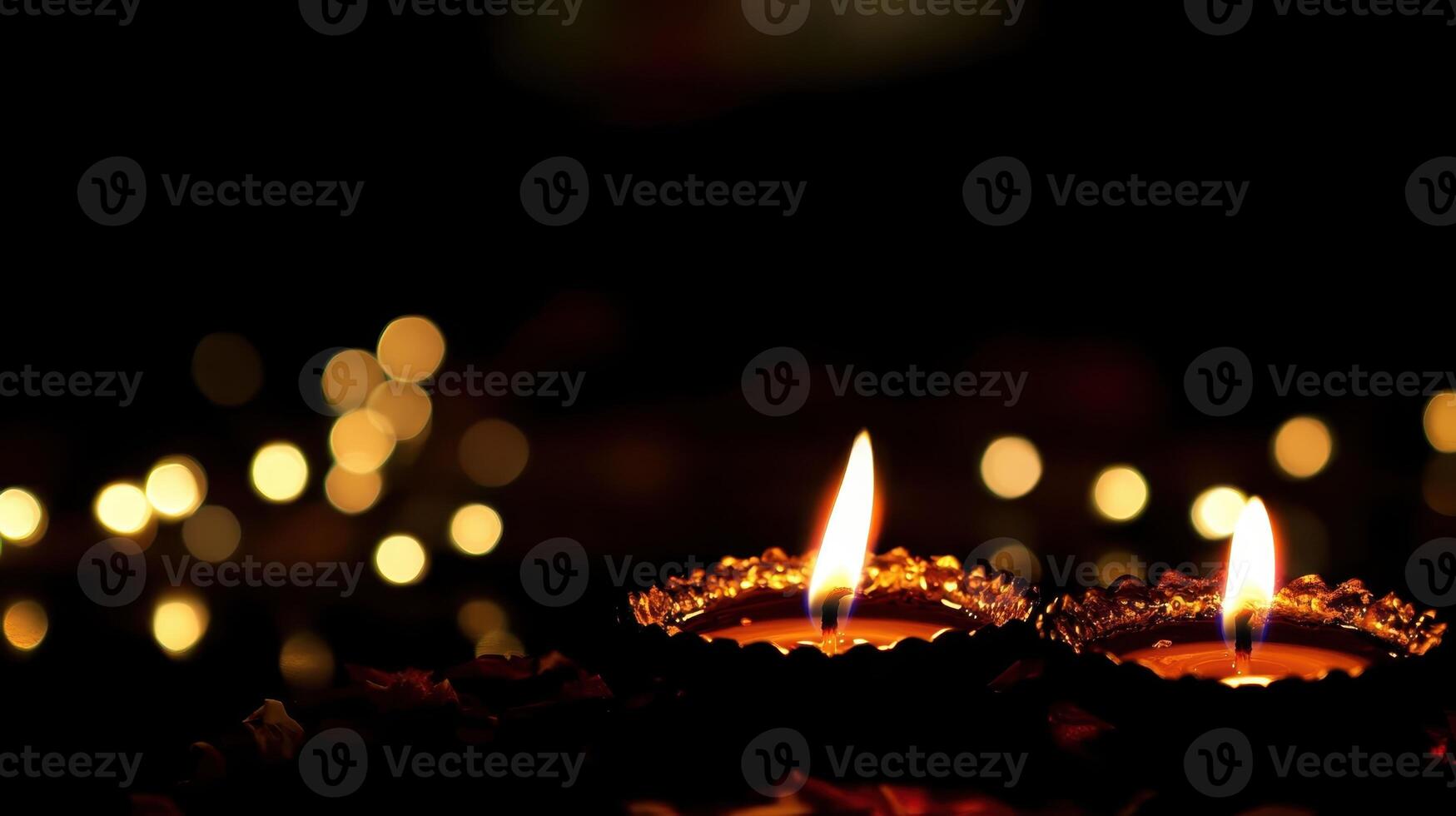 A soft-focus image of candle flames glowing against a dark background, enhanced by beautiful golden bokeh lights, creating a serene mood. photo