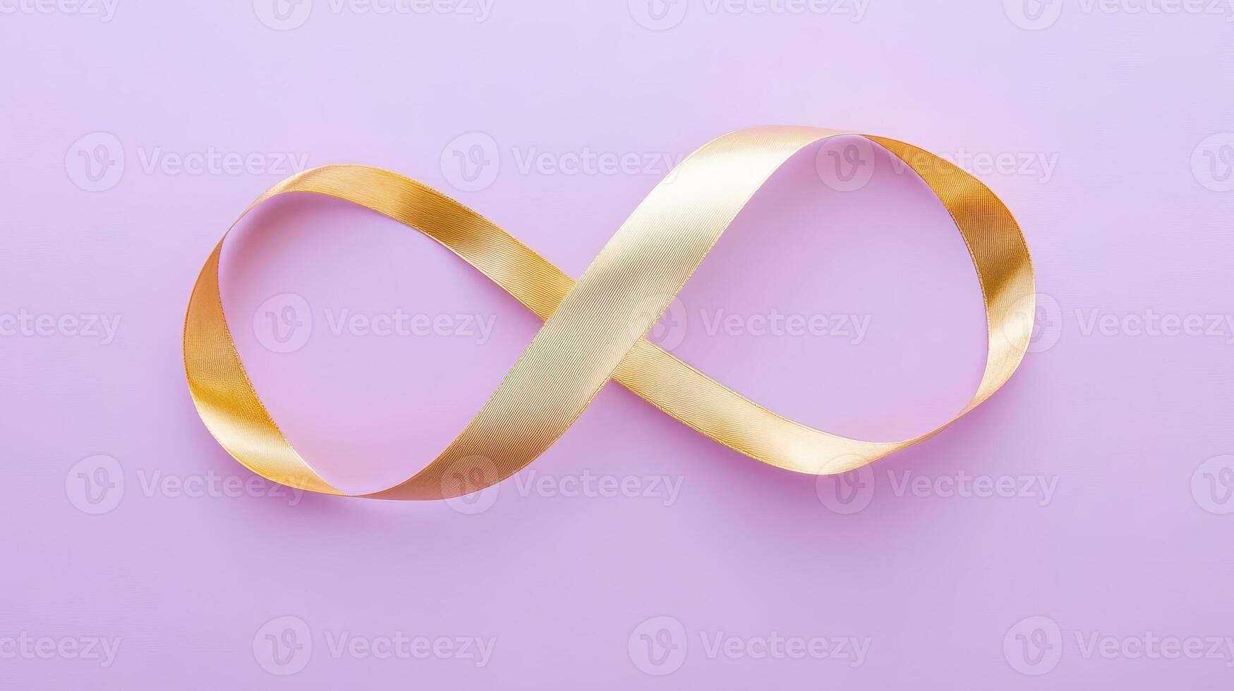 An exquisite golden ribbon, intricately fashioned in the shape of an infinity symbol, rests gracefully on a soft purple background, perfect for crafts and celebrations alike photo