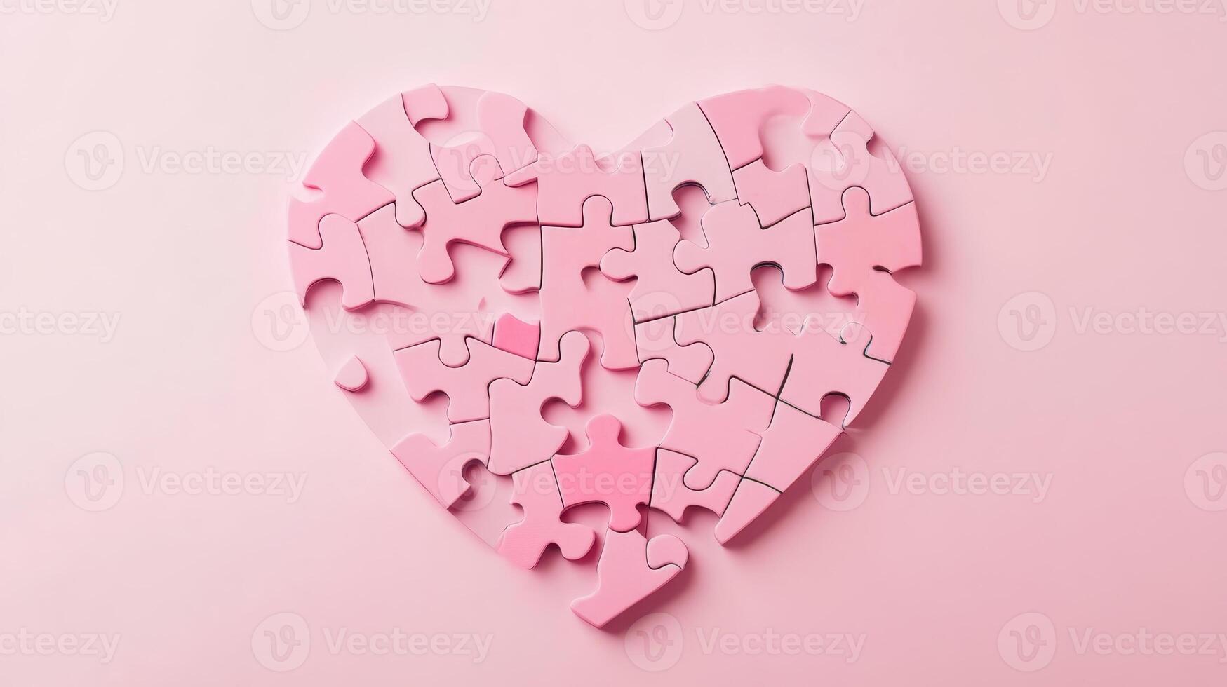 Heart-shaped pink puzzle pieces arranged on a pastel background creating a symbol of love and unity during a creative activity photo