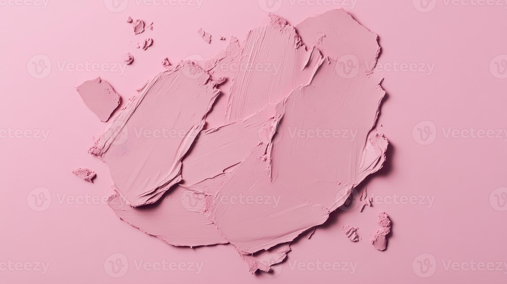 Soft pink paint swatches spread artistically across a pastel background highlighting texture and color variation photo