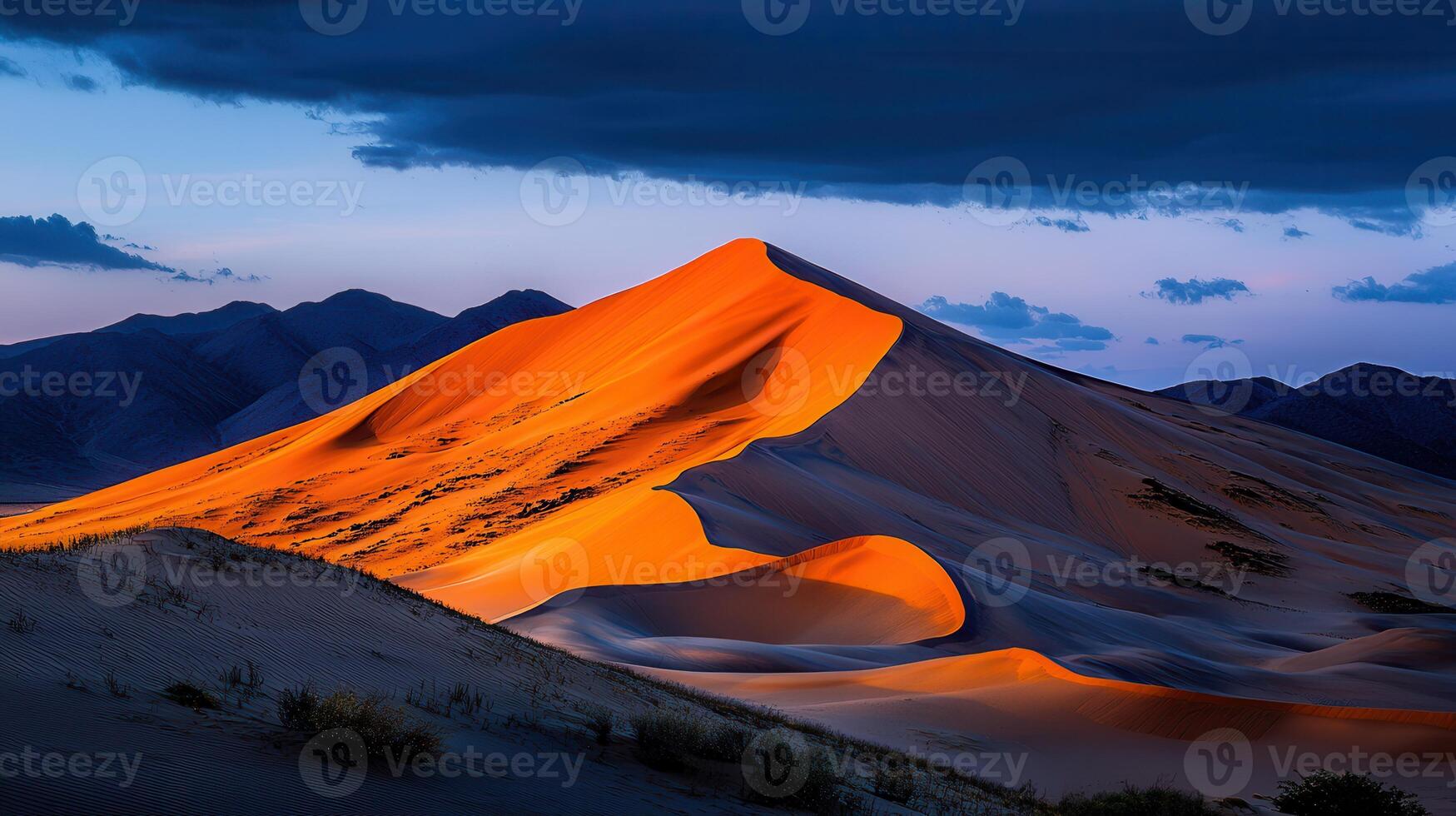 Majestic Desert Landscape Golden Sands and Dramatic Mountains at Sunset photo