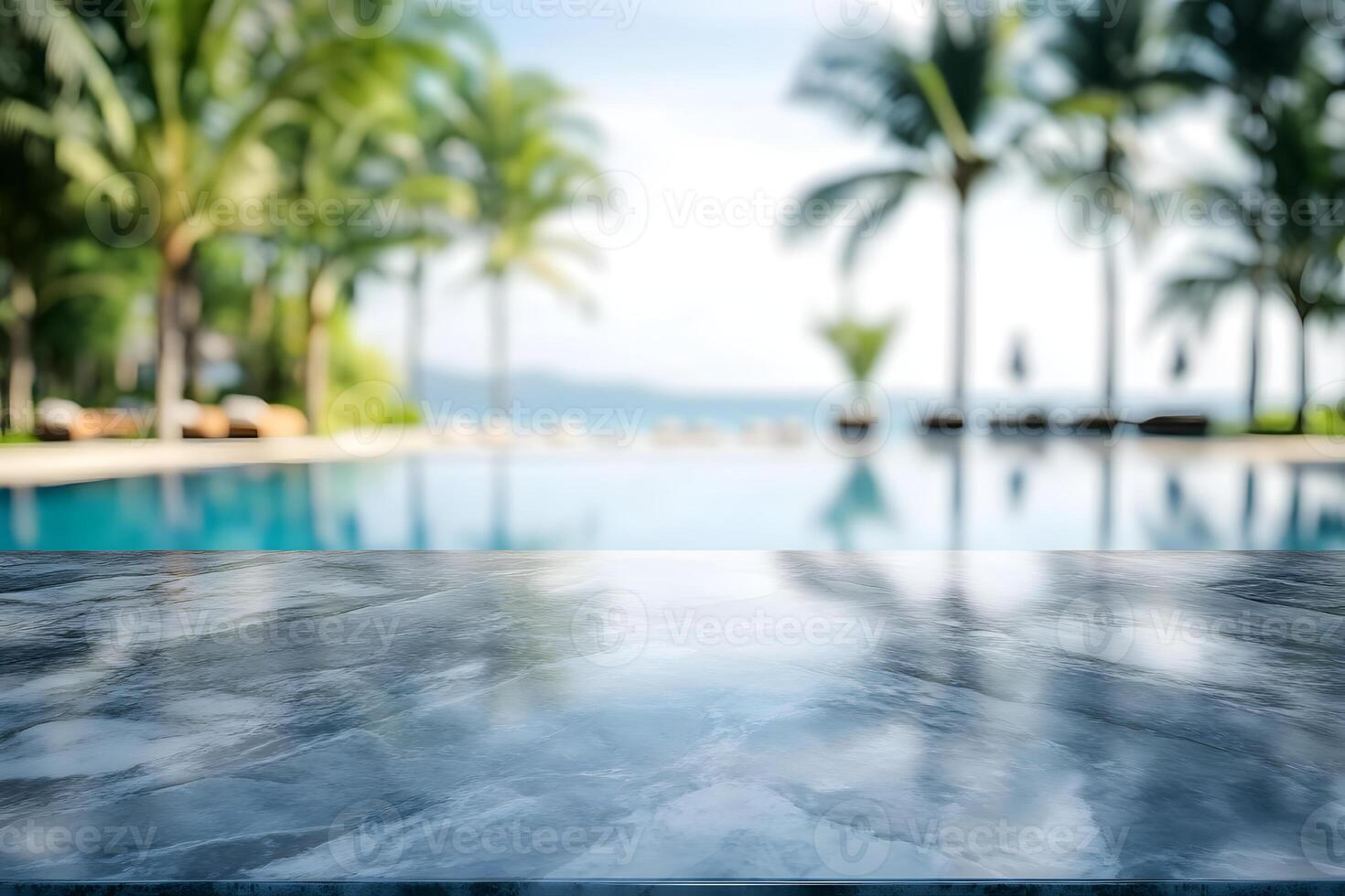 Marble Tabletop with Blurred Background of Swimming Pool and Palm Trees photo