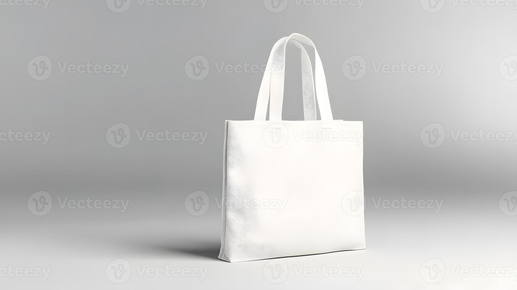 White Cotton Tote Bag Mock up Against Gray Background photo