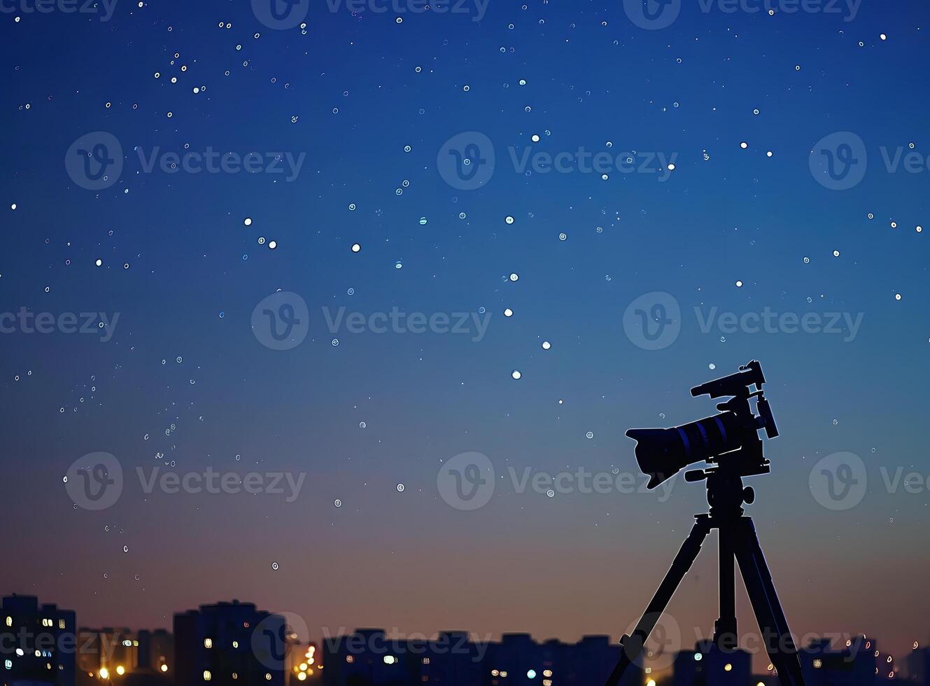 Camera on Tripod with Night Sky and City Skyline photo