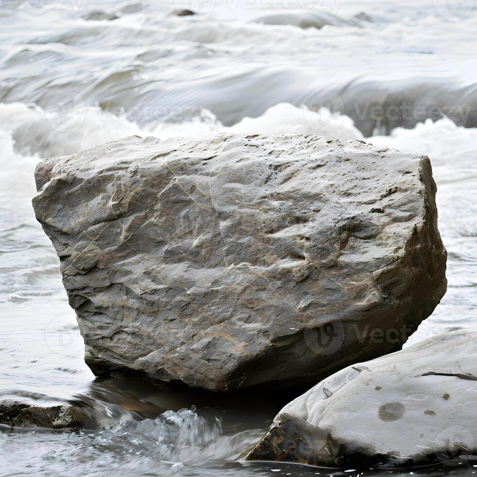 Gray Boulder in River Current photo