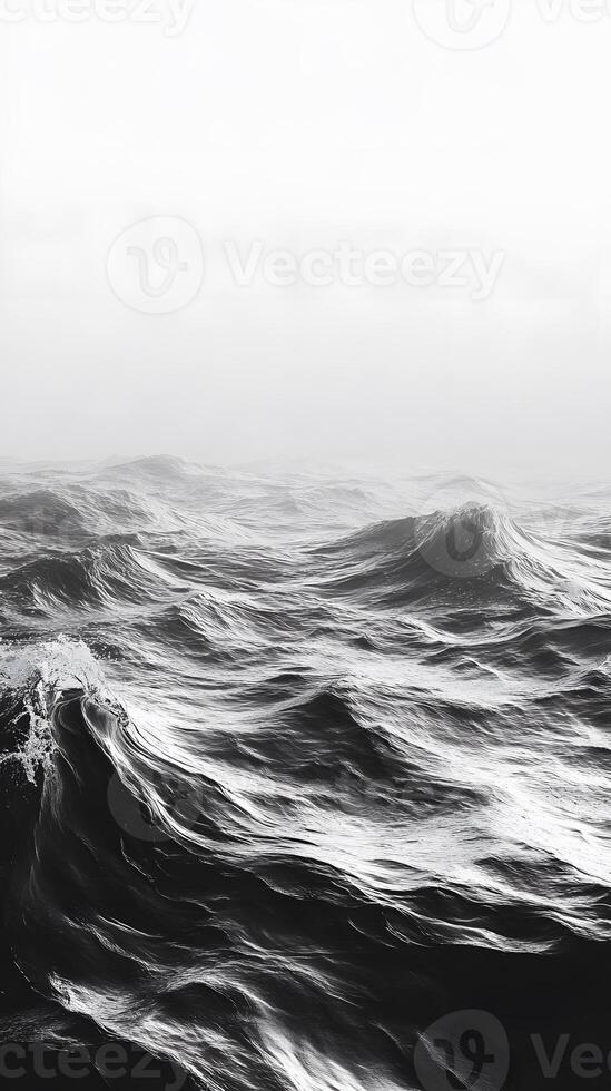 Grayscale Photograph of Ocean Waves under Hazy Sky photo