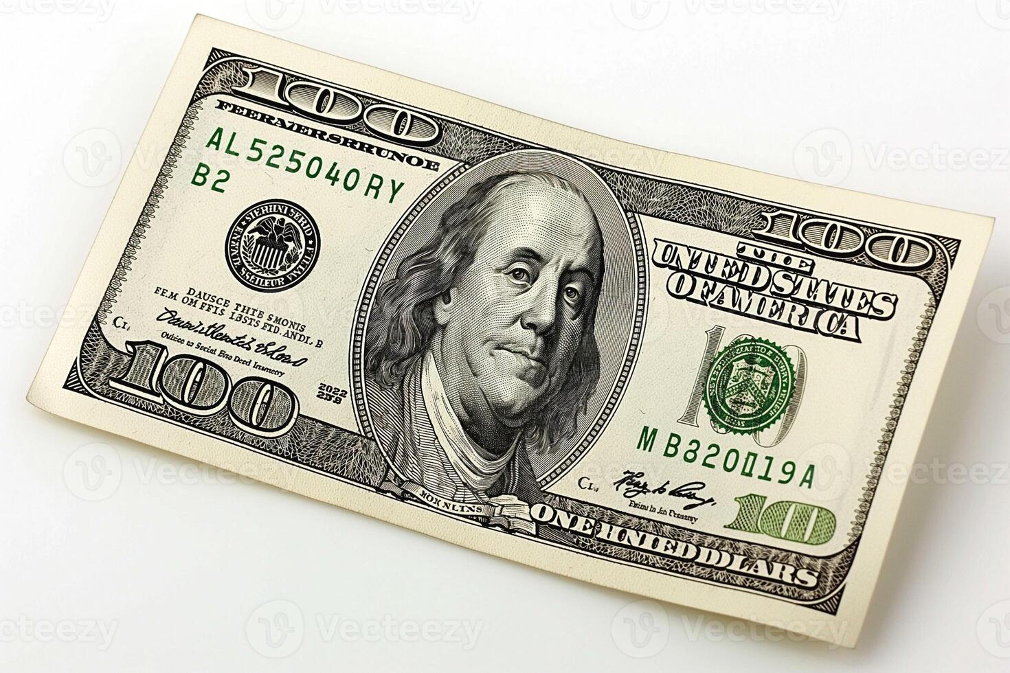 A single one hundred dollar bill featuring Benjamin Franklin, symbolizing wealth and financial success. photo