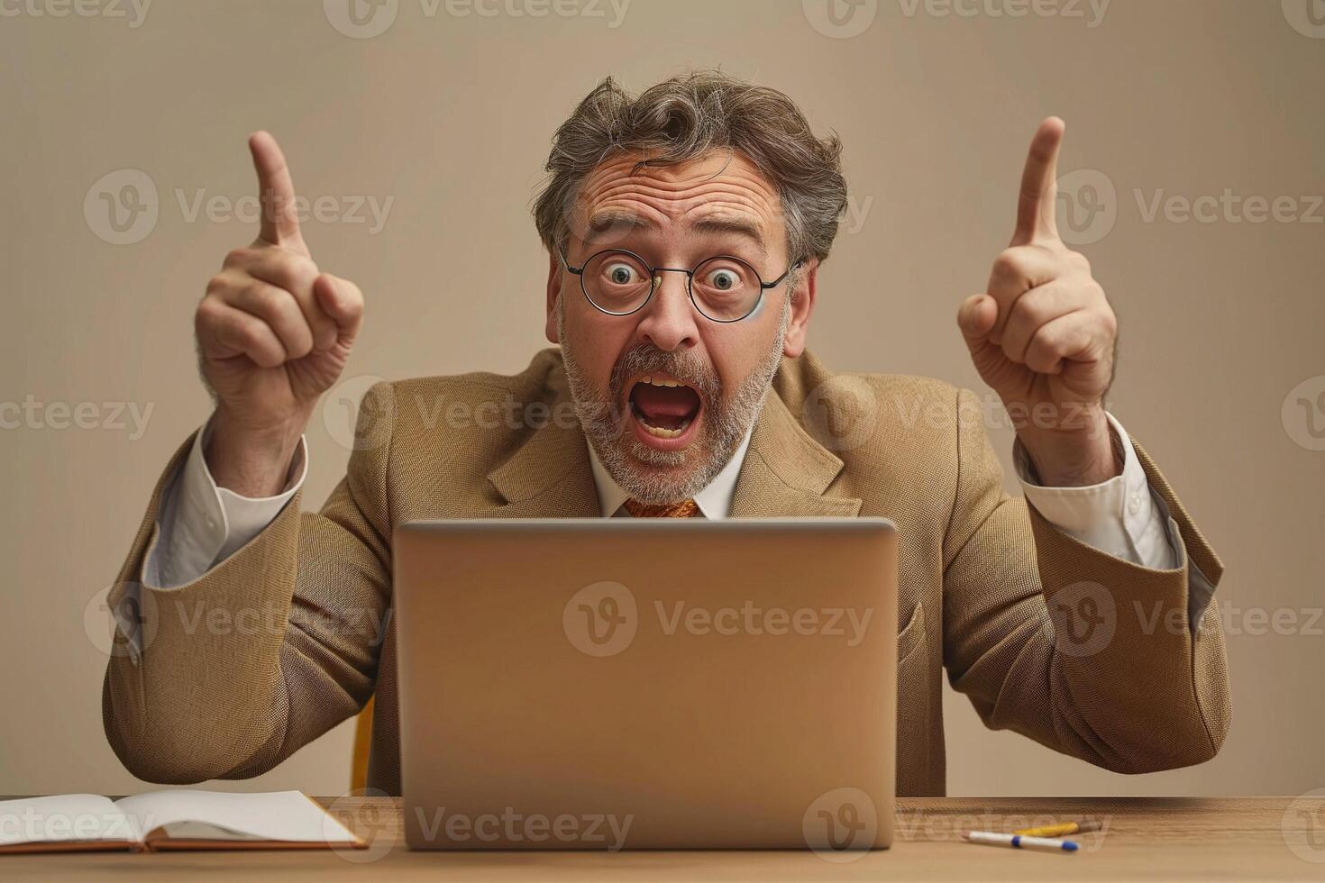 A middle-aged Caucasian man expresses excitement and frustration while working at his laptop, showcasing passion and intensity. photo