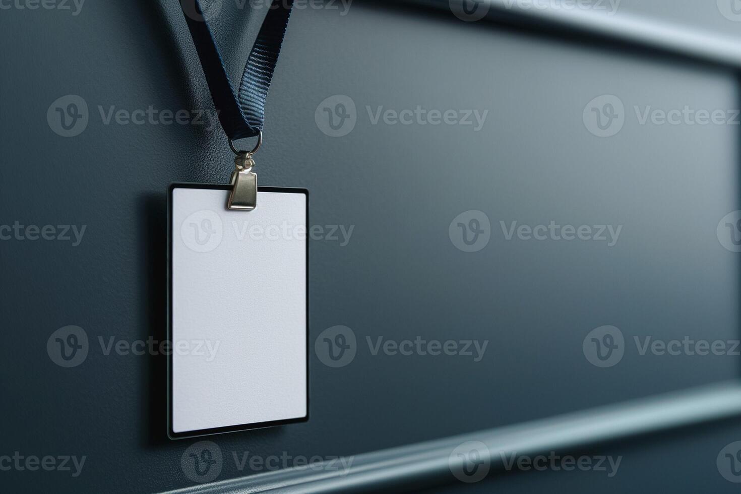 Blank ID badge hanging on a dark background, ideal for customization and professional events. photo