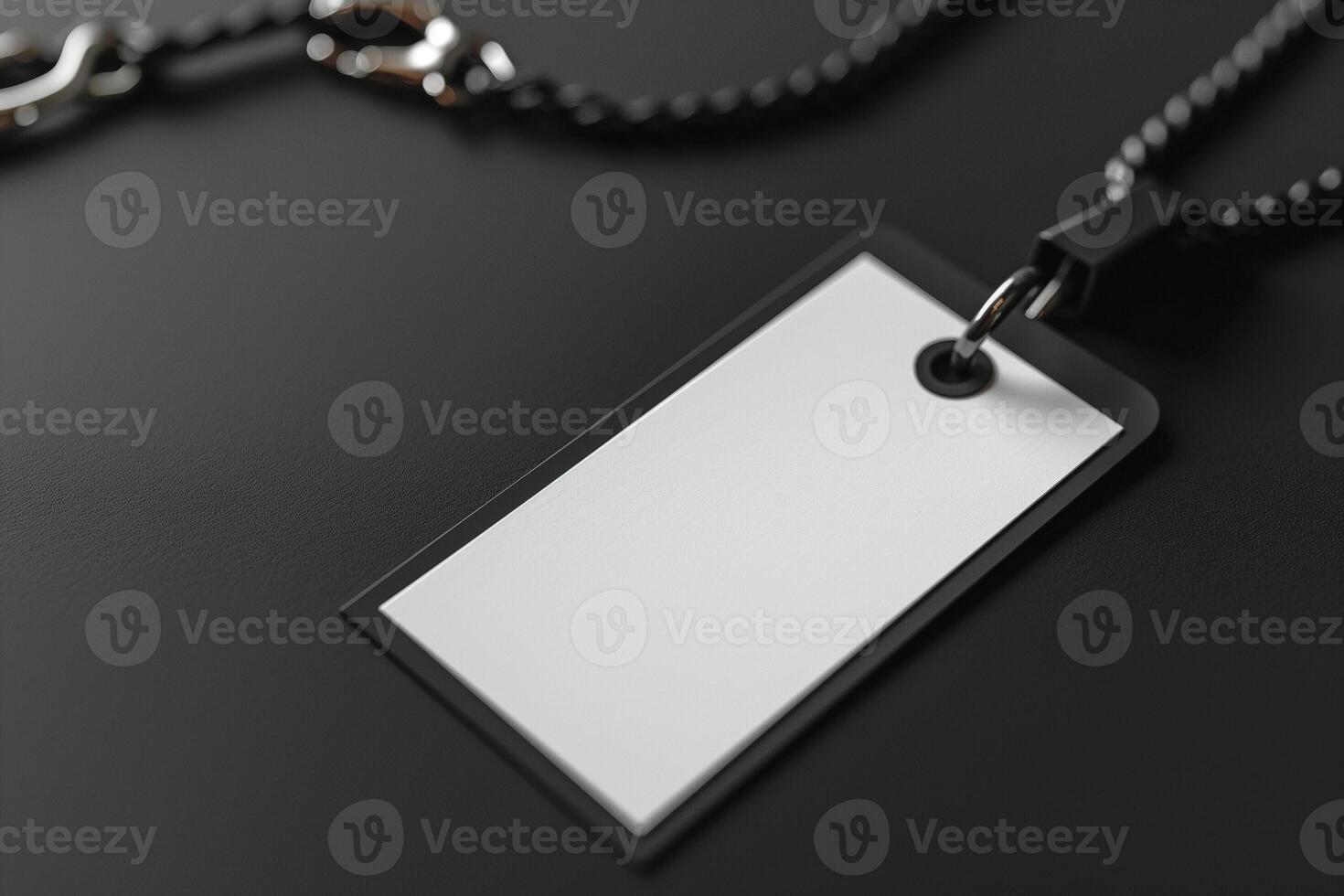 Stylish blank name tag on a black background, perfect for personalization. photo