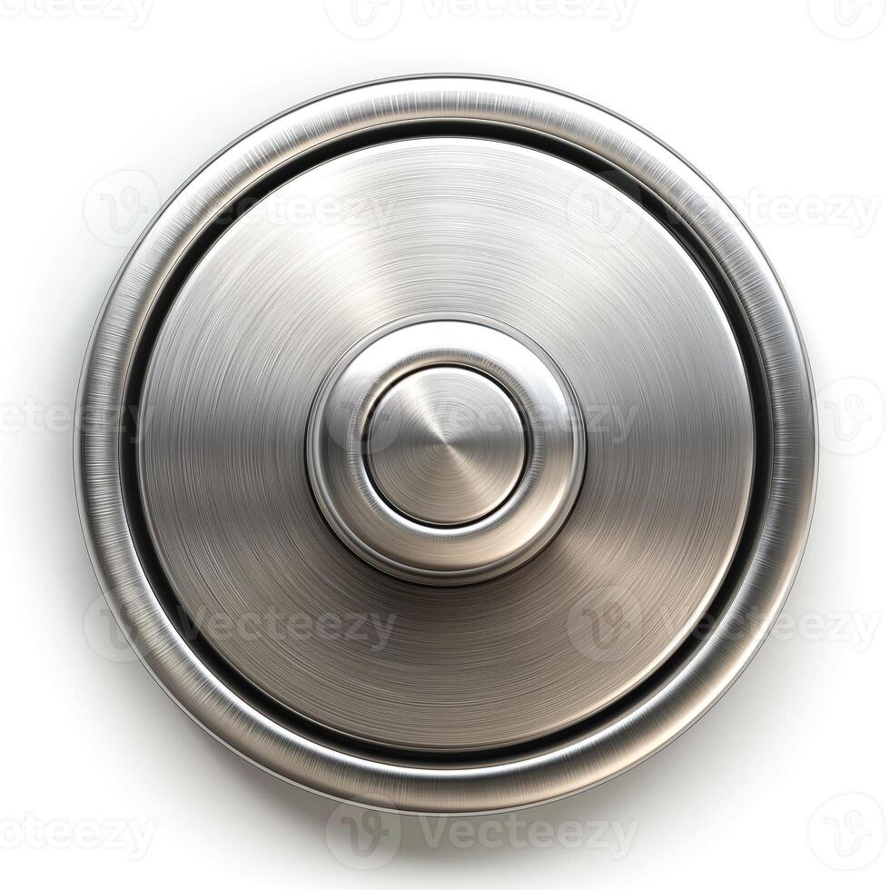 Close-up of a stainless steel circular button on a white background. photo