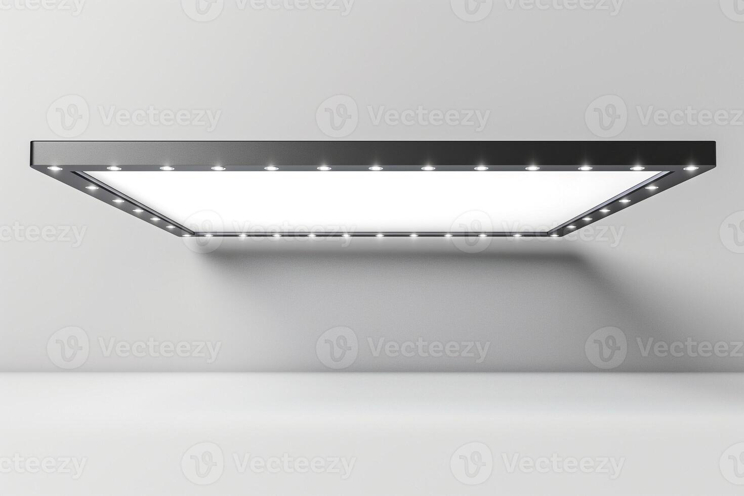 Sleek modern LED ceiling panel light illuminating a minimalist space. photo