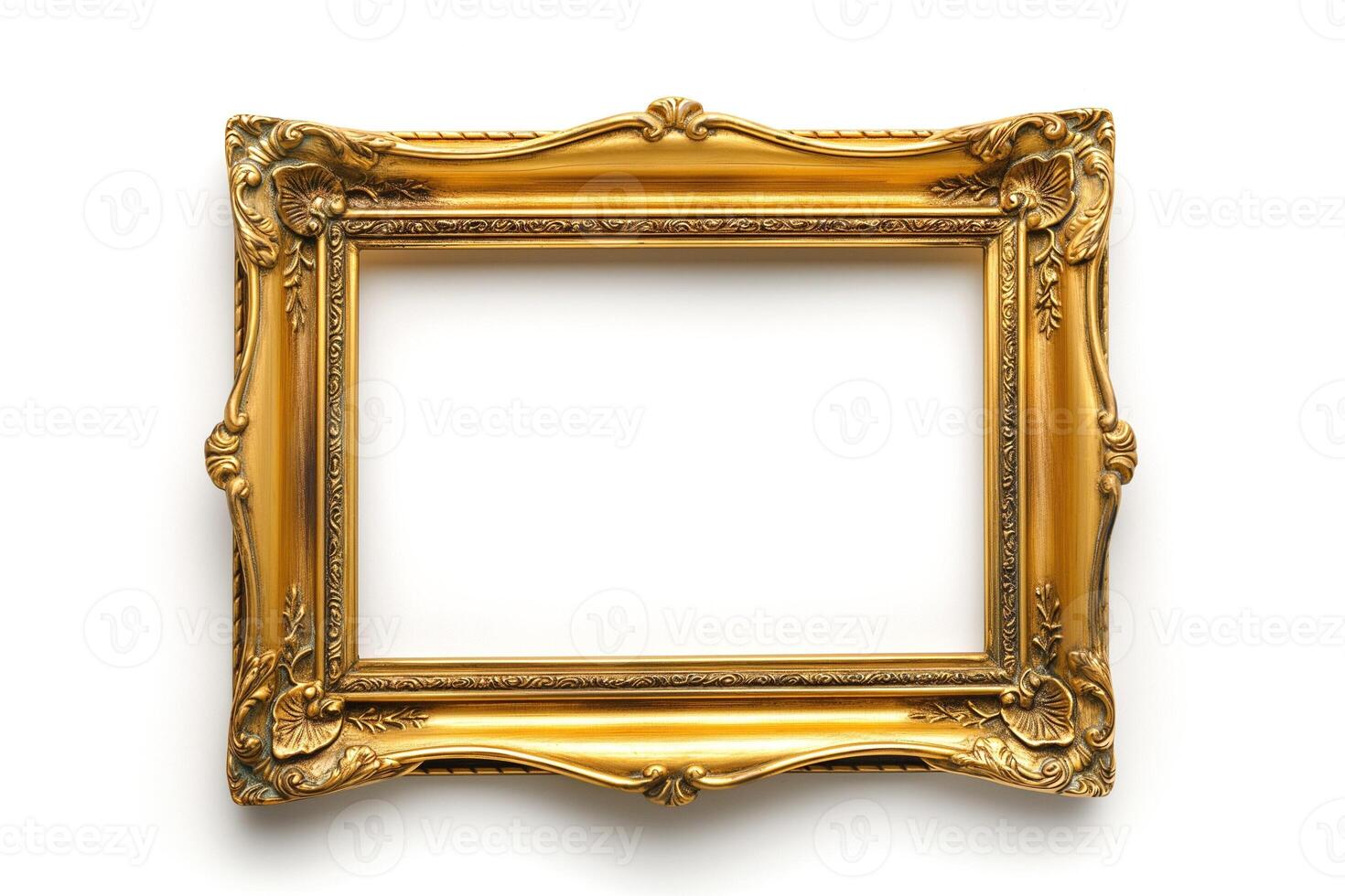An ornate golden picture frame with intricate designs, perfect for displaying art or cherished memories. photo