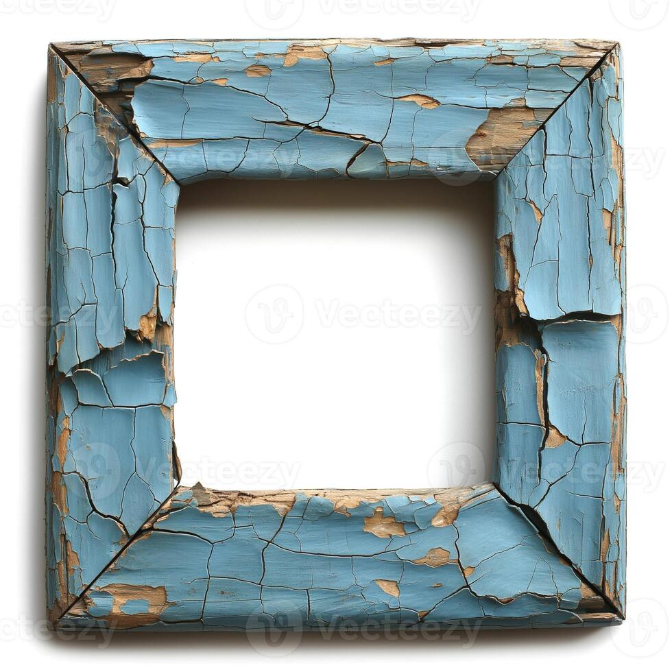 A weathered blue wooden frame with peeling paint, evoking a rustic, vintage feel. photo