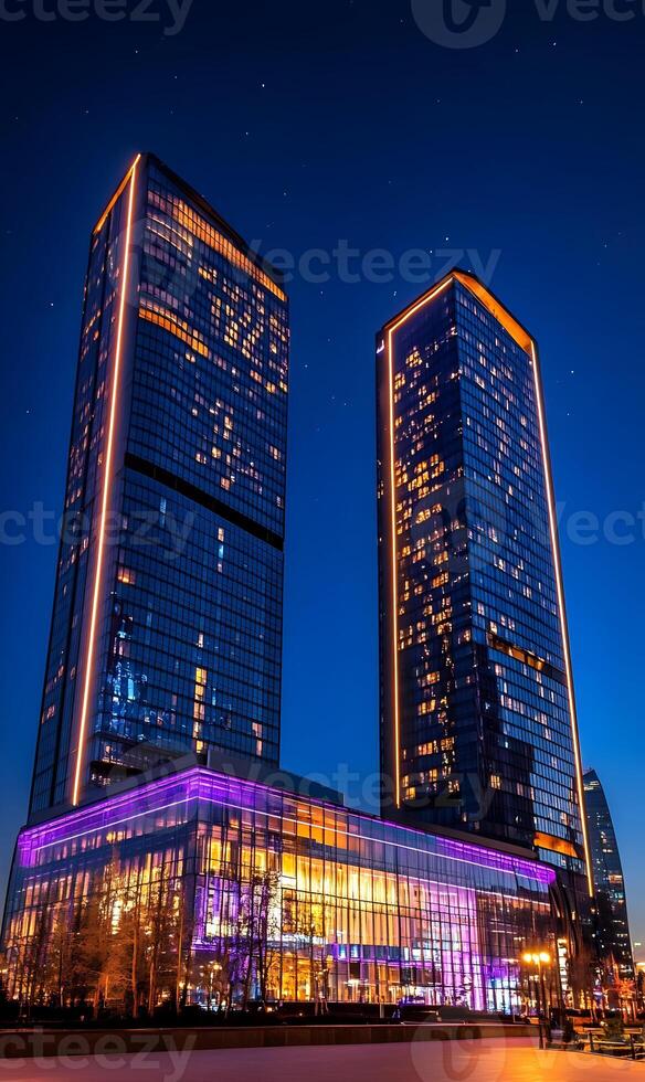 maravilloso gemelo rascacielos ligero arriba el noche cielo, encarnando moderno arquitectónico maravillas foto