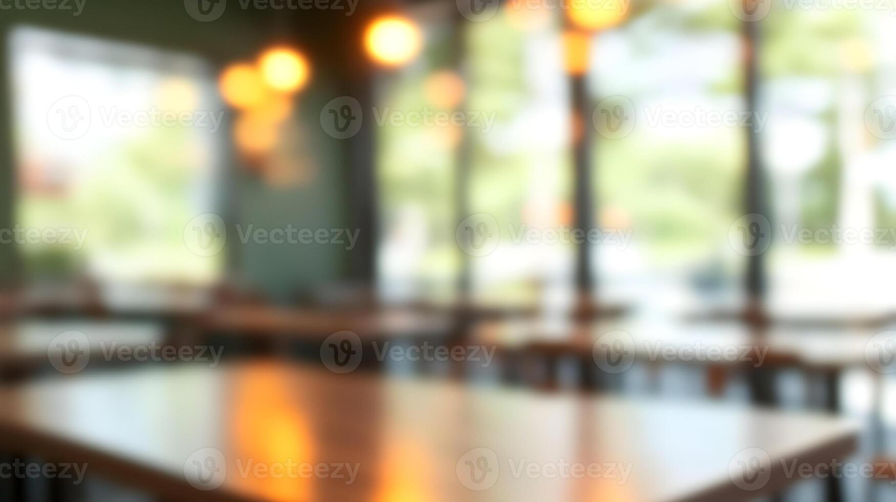 Softly blurred school cafeteria interior featuring long tables and chairs providing background depth photo