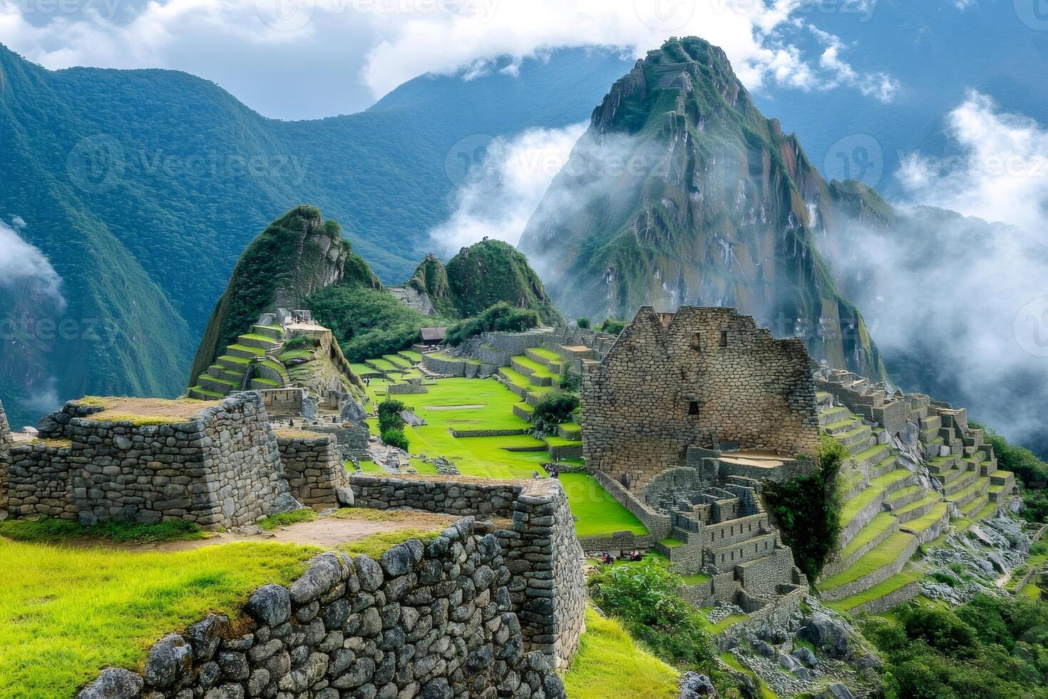 Machu Picchu revealing its majesty under the clouds in Peru photo